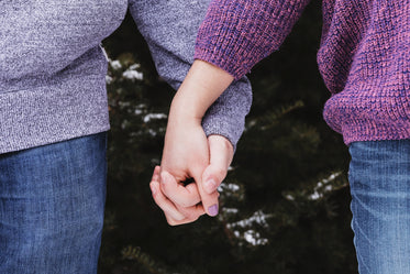 holding hands in the cold