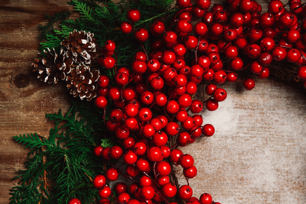holiday berry decor on wood