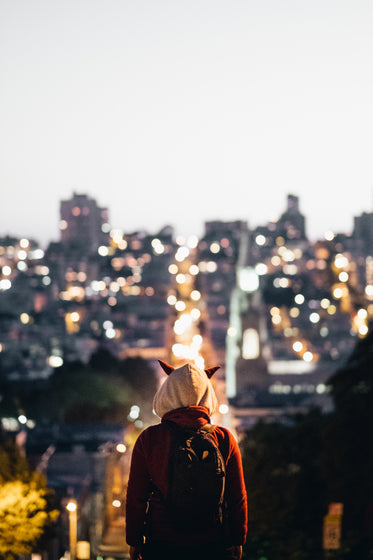 horned hood watches over city