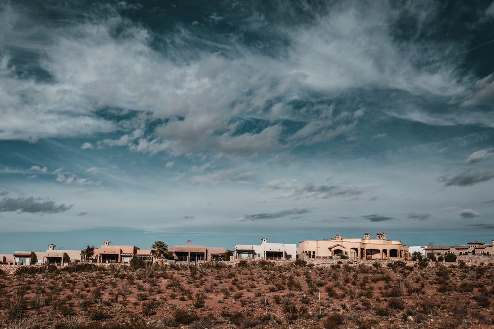 houses under blue desert sky