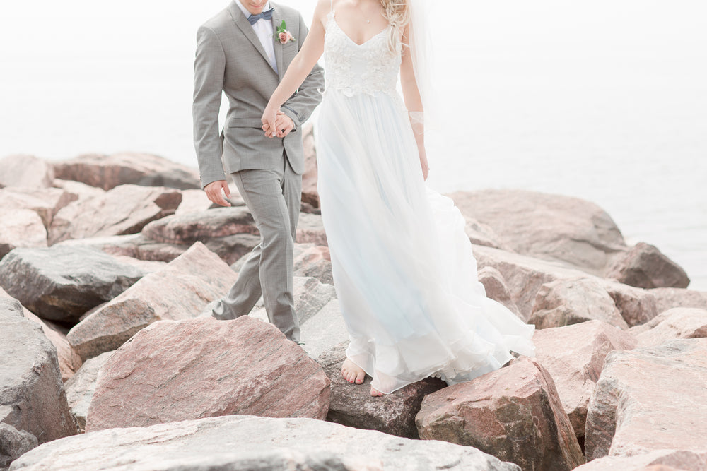 husband and wife on the rocks