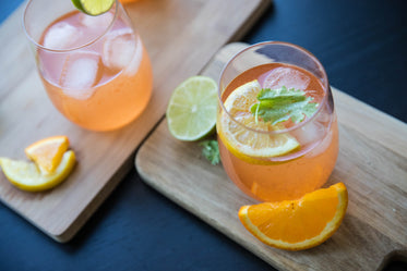 iced orange drinks with citrus garnish