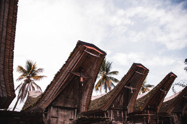 indonesian rooftops below the clouds