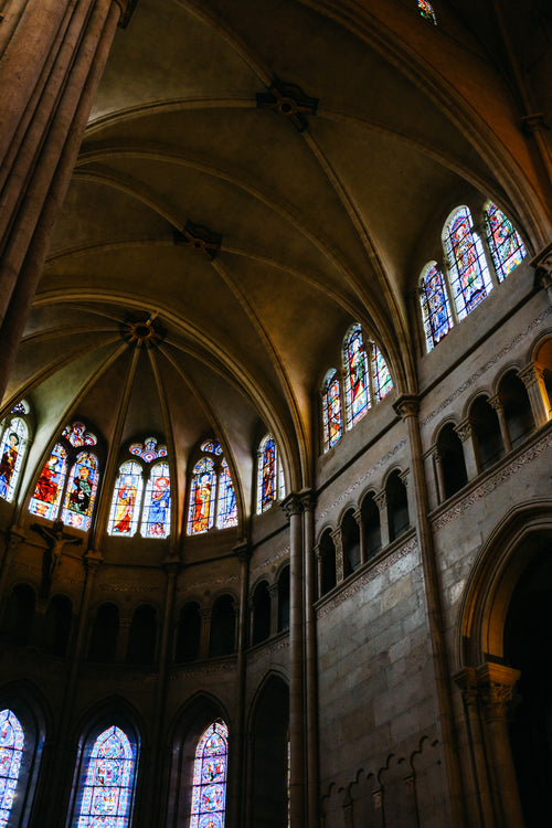 interior of a building with stained glass windows