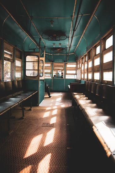 interior of an aqua blue bus