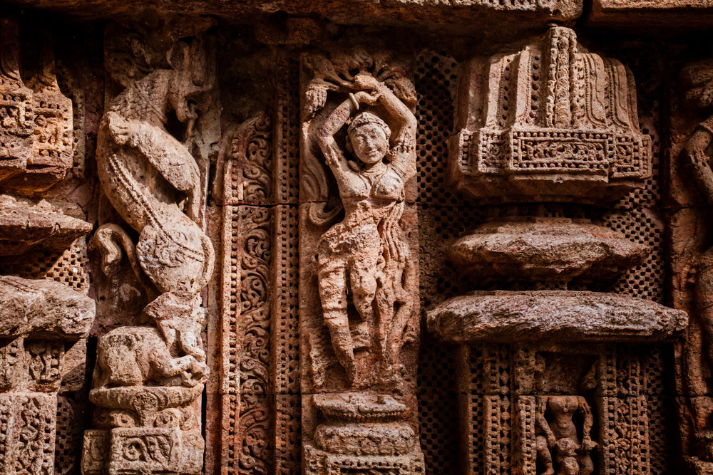 intricate stone sculpture with pillars