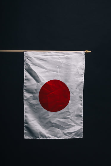 japanese flag against black