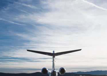 Free Jet Plane Tail And Sky Photo — High Res Pictures