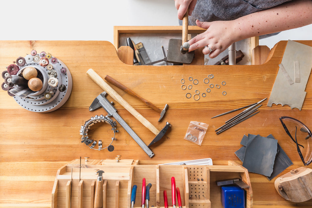 jeweler working at workbench