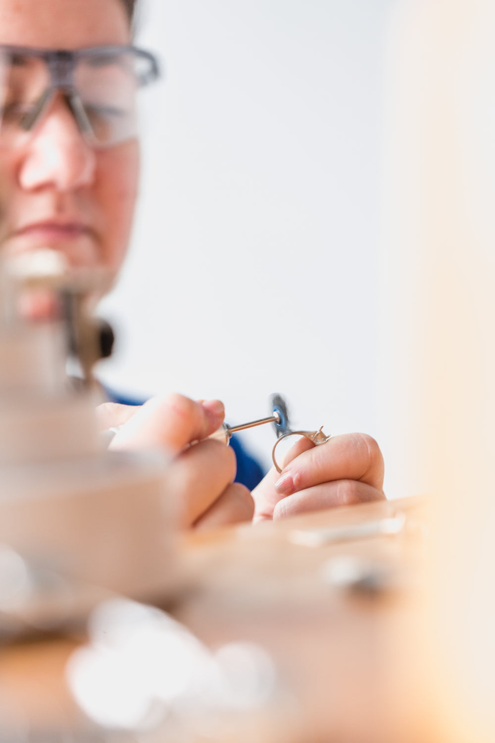 jeweler working on ring