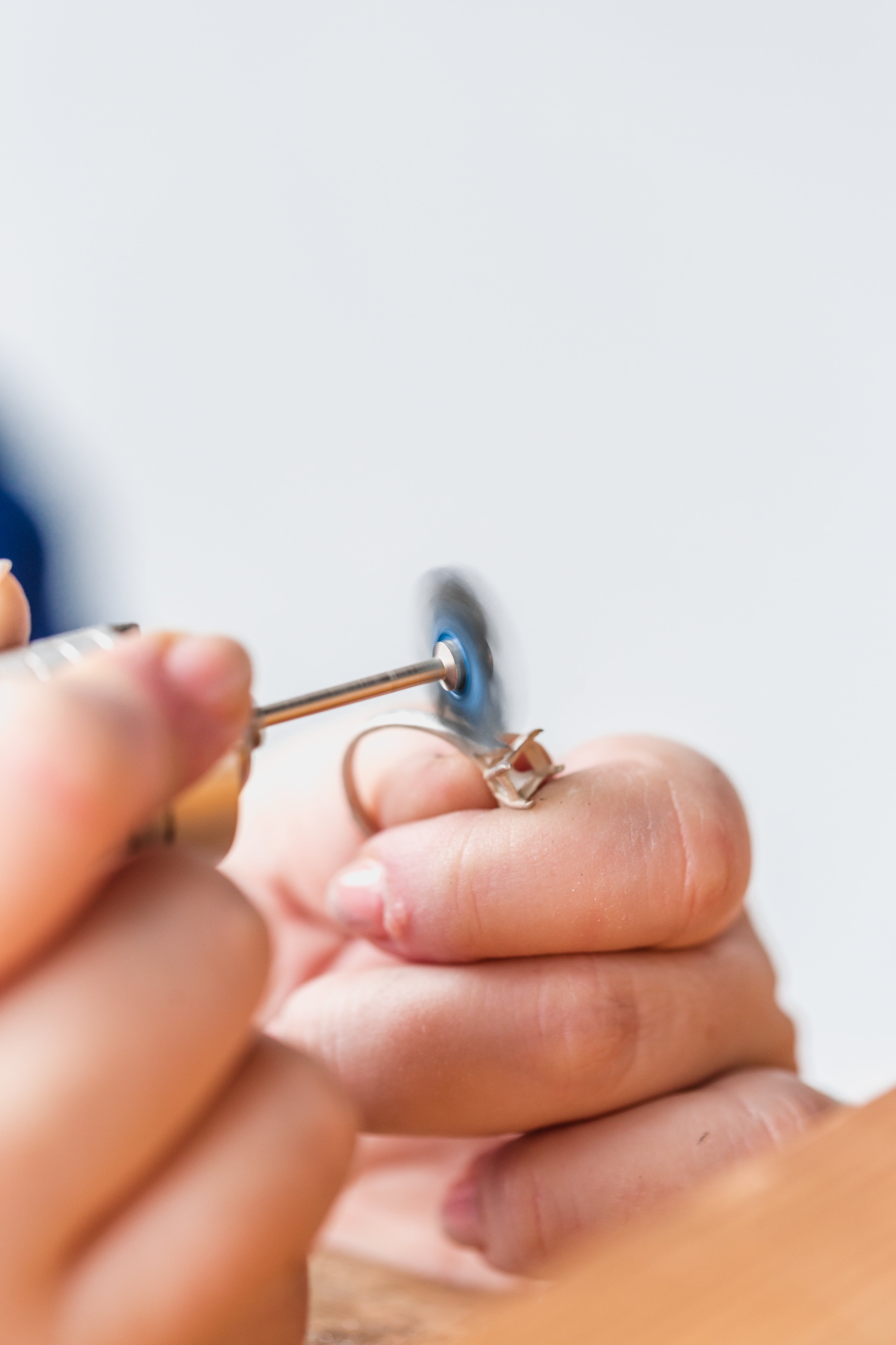 Jeweler Polishing A Ring Stock Photo - Download Image Now - Jewelry,  Polishing, Shiny - iStock