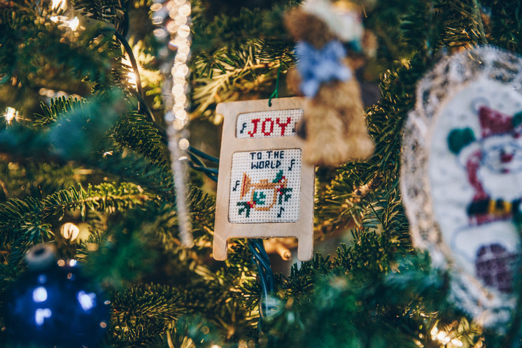 joy ornament on tree