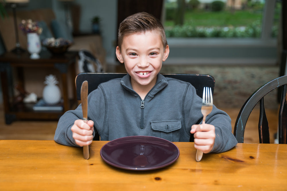 kid boy ready for dinner