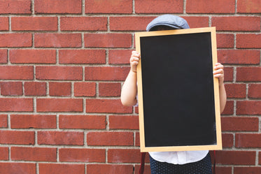 high res kid with blank chalkboard picture free images