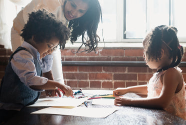 kids coloring with mom