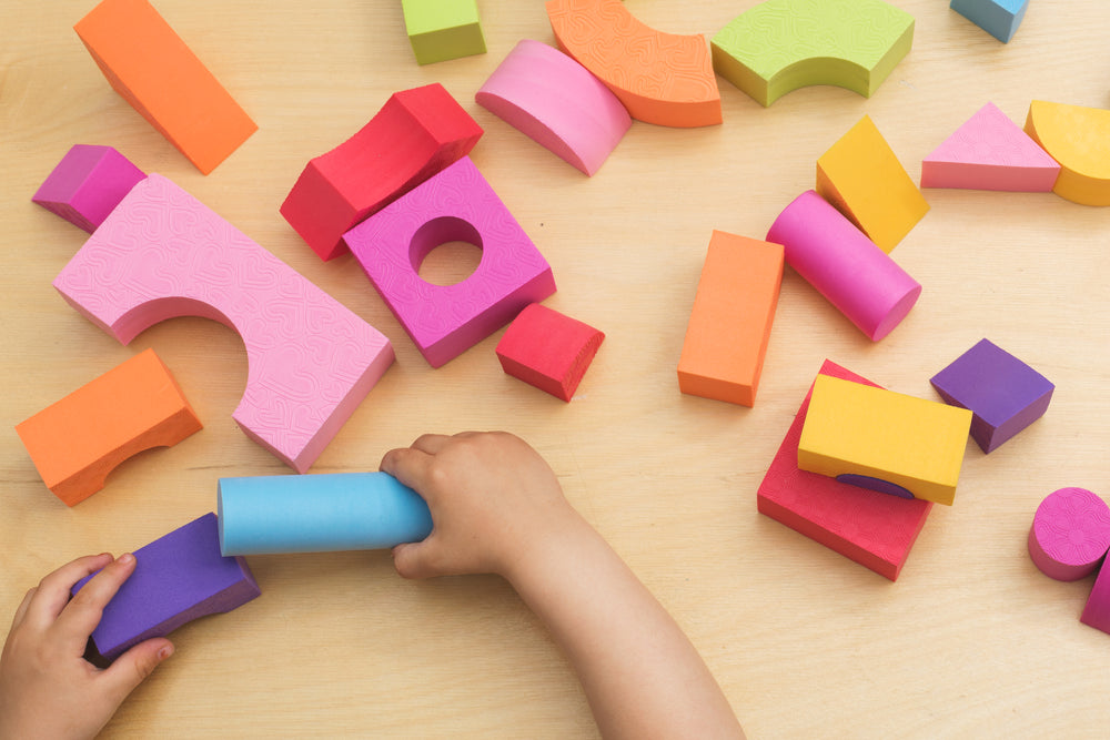 kids playing with block toys