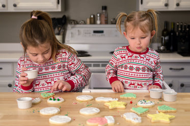 kids playing with cookie decorations