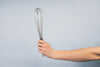 kitchen whisk tool in hand