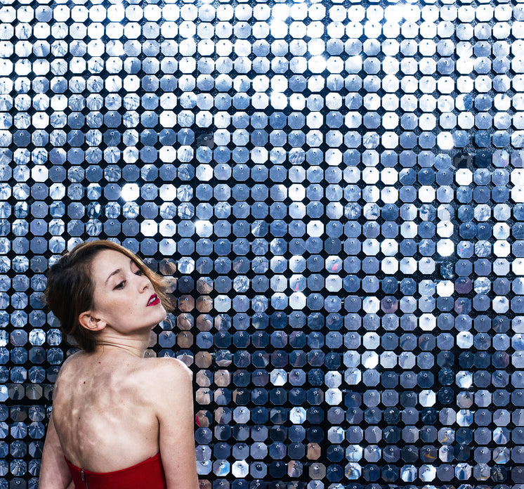 lady-in-red-clinging-to-a-curtain-of-mir