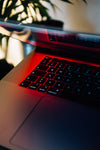 laptop keyboard in red hue