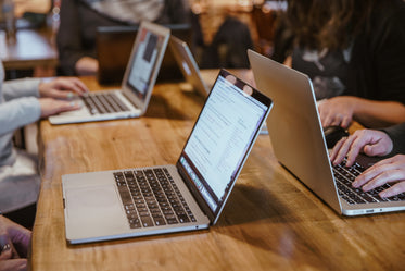 laptops at workstations coding