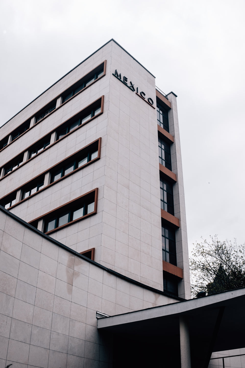 large grey building with the word mexico on the side