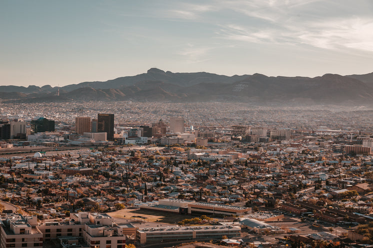 Large Mountains Surround A City