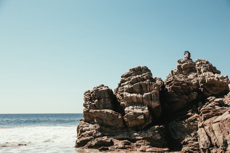 Large Rock Face On Beach