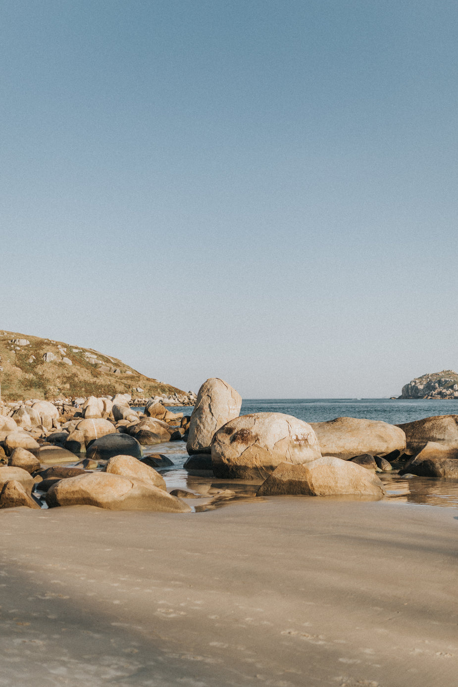 Large Round Rocks Browse Free HD Images of Large Round Rocks Scattered On A Sandy Beach