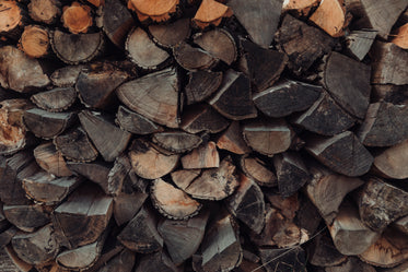 large stack of firewood for winter