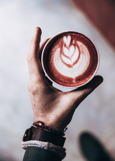latte art in hand