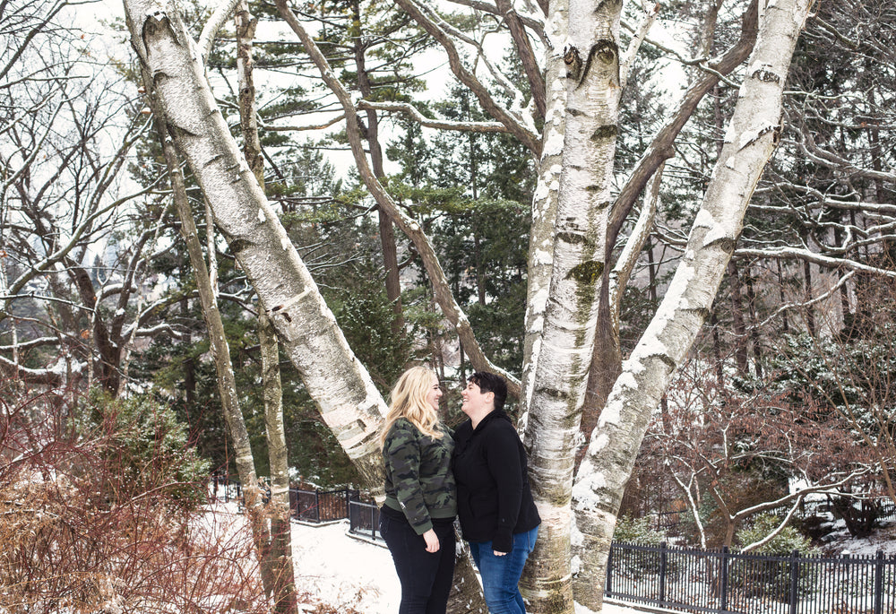 laughing together in the snow