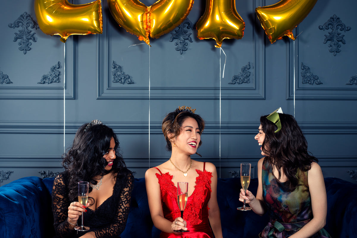 laughing women celebrate the new year