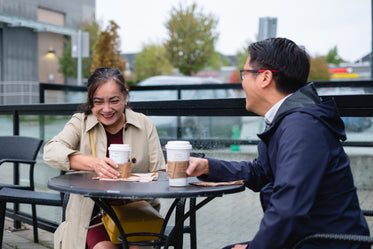 laughter and coffee in a cafe