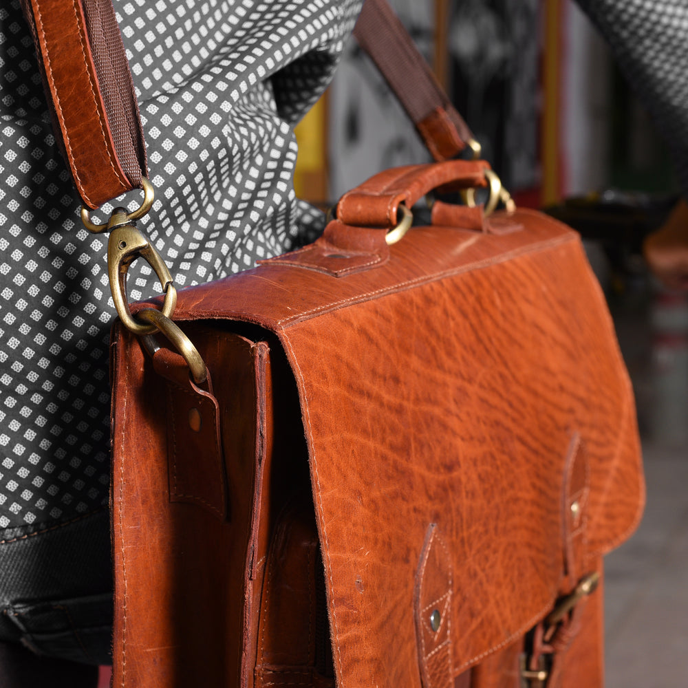 leather messenger bag handle