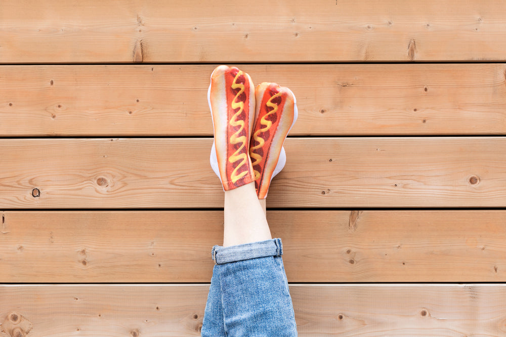 legs crossed hot dog socks