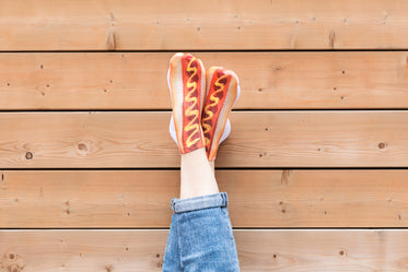 legs crossed hot dog socks