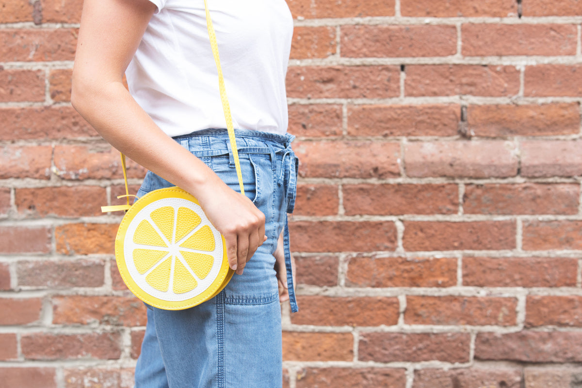 lemon purse being worn