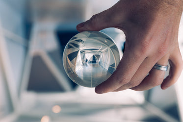 lensball person walking down hallway