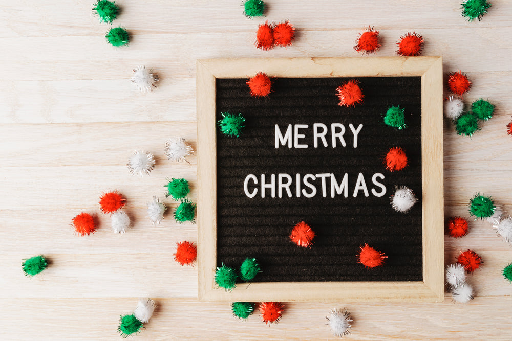 letter board with the words merry christmas