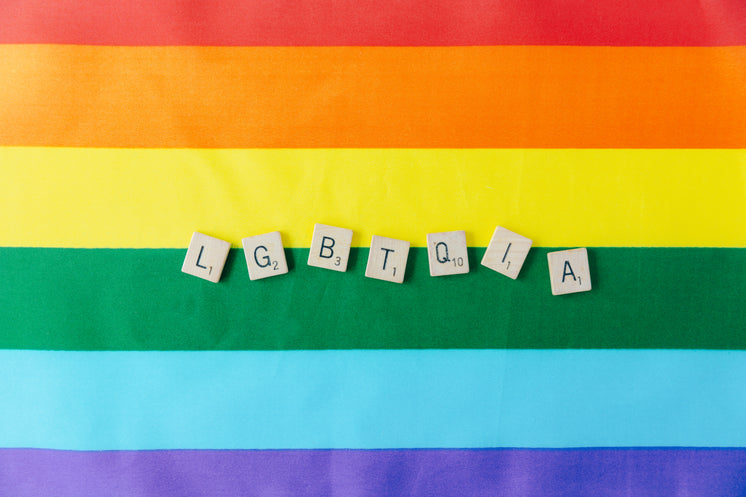 lgbtqia-letters-on-a-pride-flag.jpg?widt