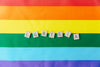 lgbtqia letters on a pride flag