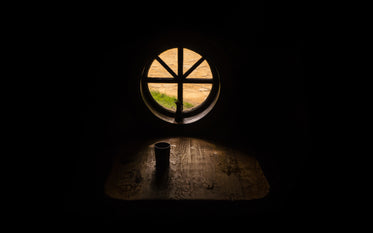 light on a wooden table and mug