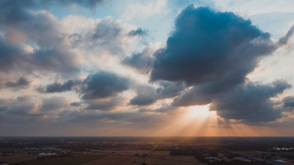 light rays leaking through athick clouds