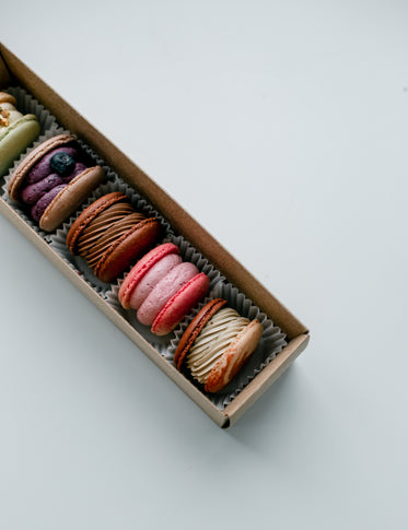 line of perfectly made macarons