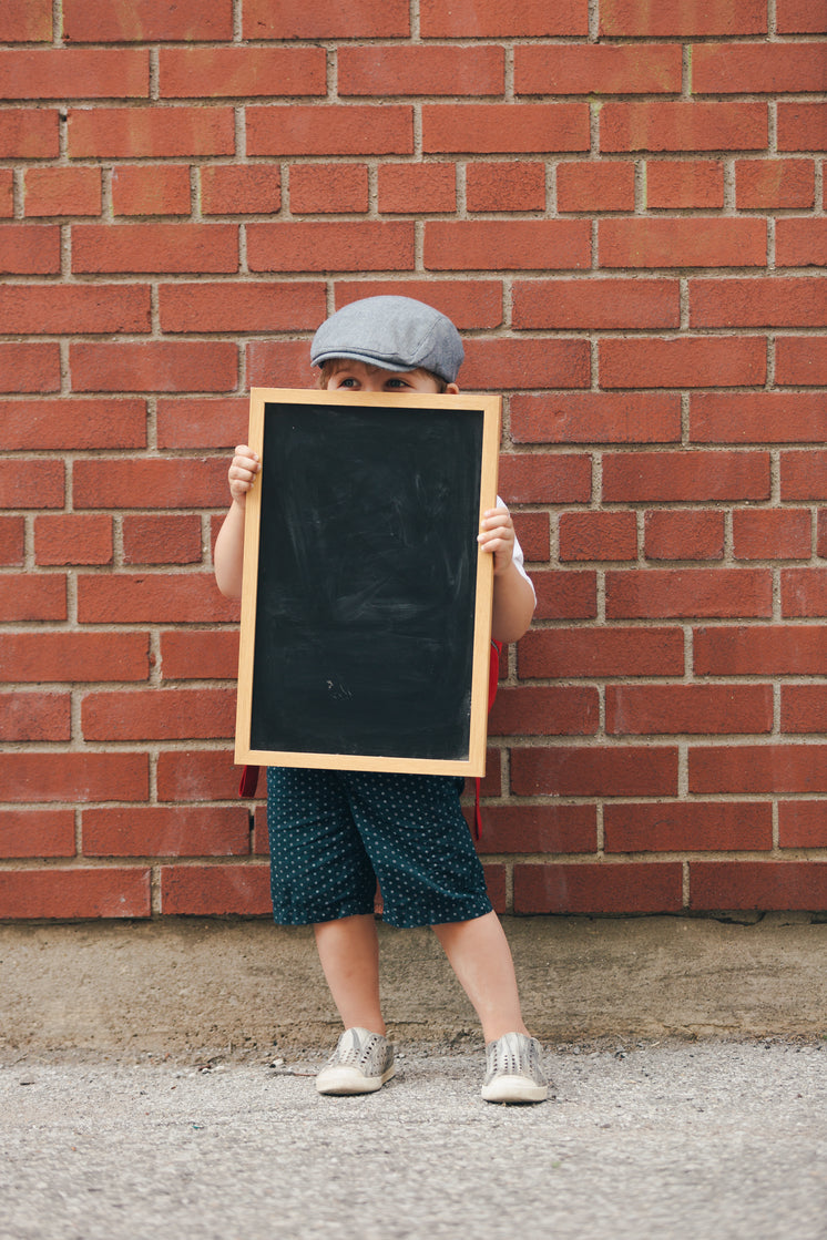 little-boy-holding-blank-chalkboard.jpg?