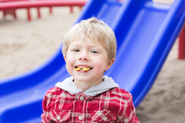 little boy snacking