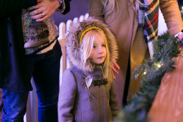 little girl at holiday market