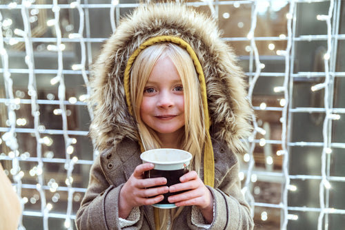 little girl hot cocoa