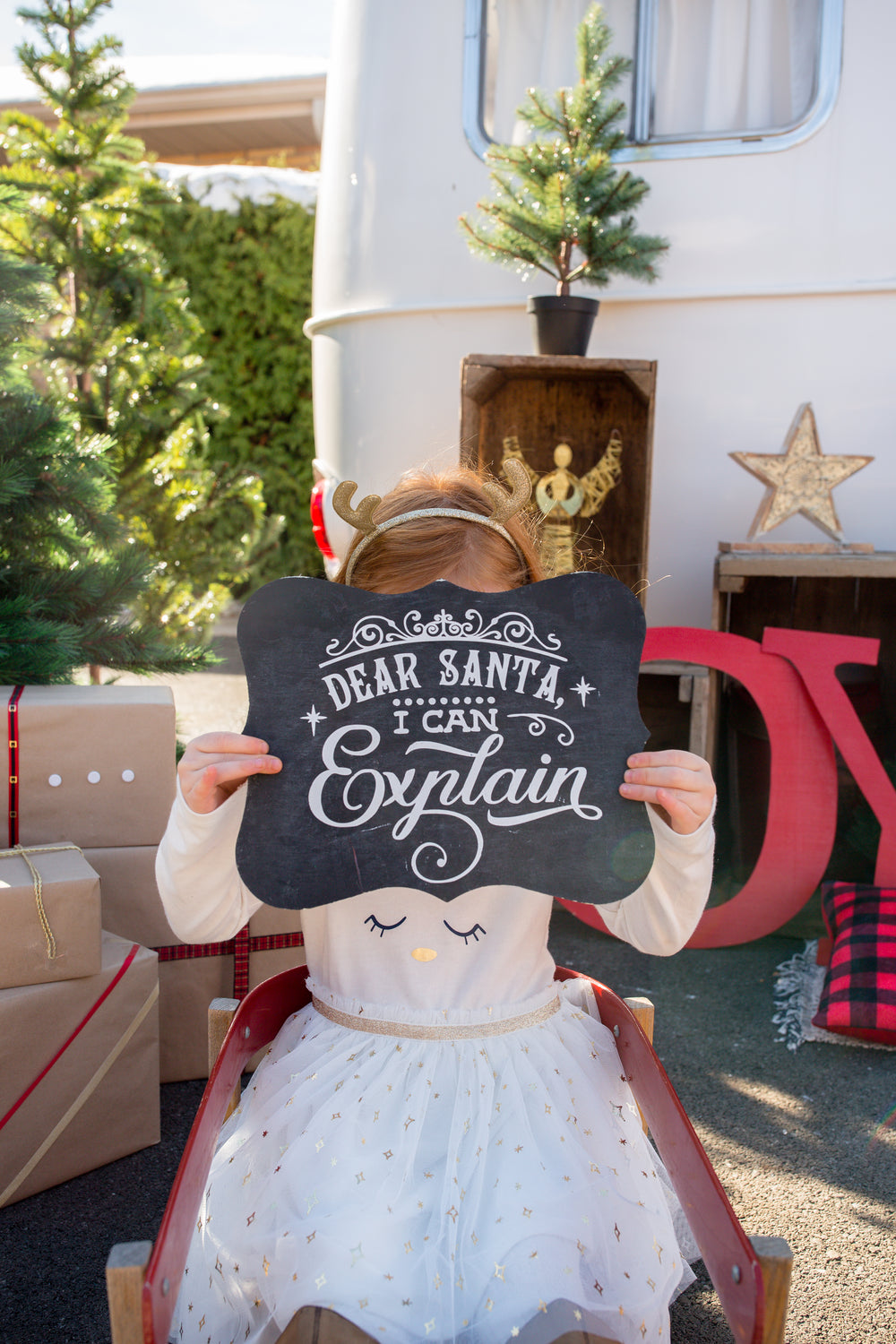 little girl taking christmas photos